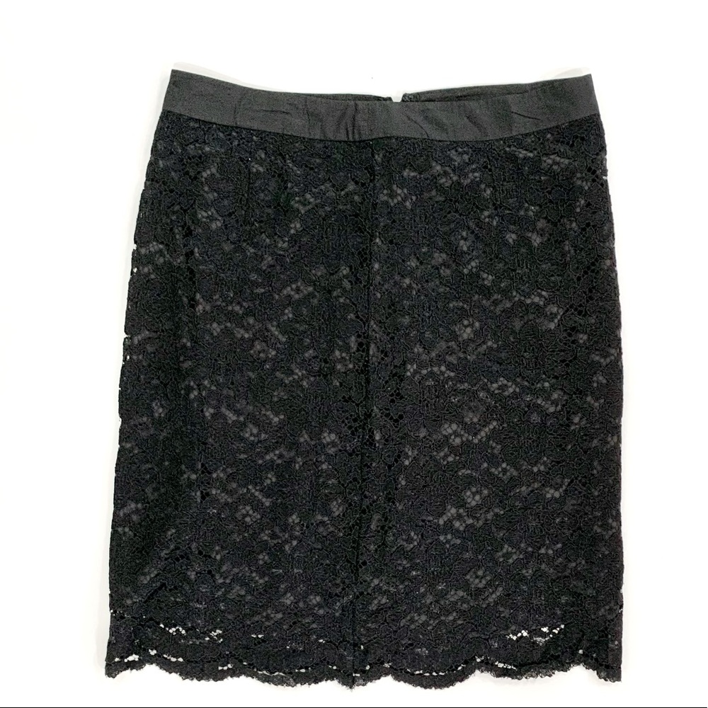 Trulli Size 10 Lace (non stretchy) skirt with back zipper.